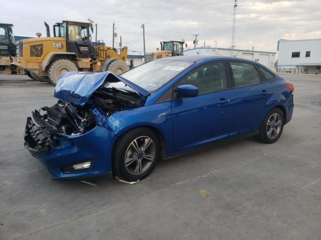 FORD FOCUS SE 2018 with VIN 1FADP3F20JL298997 - Photo from auction