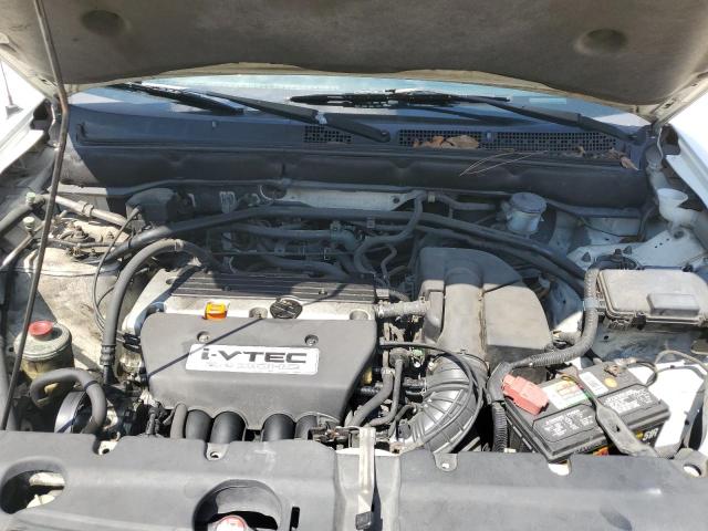 Photo 12 from auction – 2004 HONDA CR-V LX with VIN JHLRD68444C011564