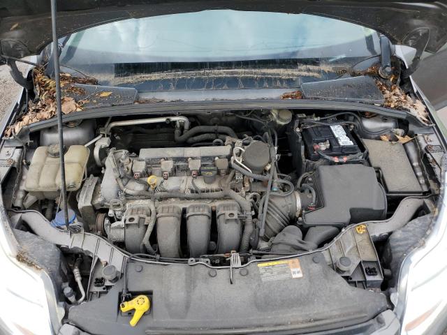 Photo 11 from auction – 2014 FORD FOCUS SE with VIN 1FADP3F21EL147673