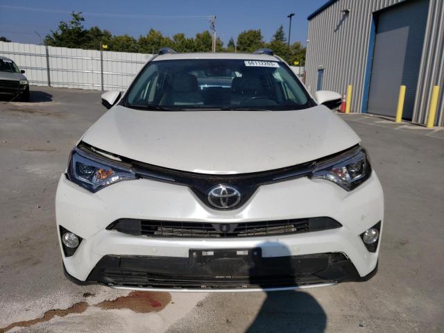 Photo 5 from auction – 2018 TOYOTA RAV4 LIMIT with VIN JTMDFREV0JD230981