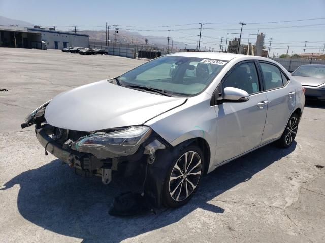 TOYOTA COROLLA L 2018 with VIN 5YFBURHE1JP759572 - Photo from auction