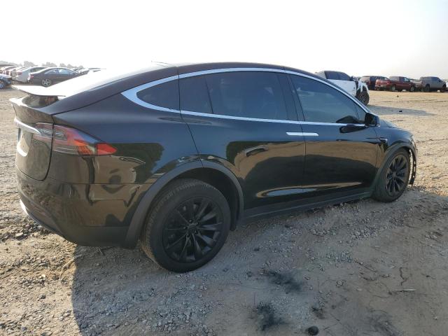 Photo 3 from auction – 2017 TESLA MODEL X with VIN 5YJXCDE22HF051049