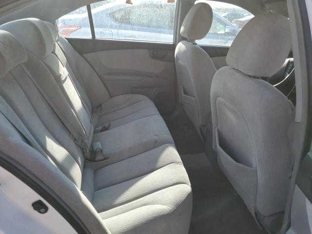 Photo 10 from auction – 2006 KIA OPTIMA LX with VIN KNAGE124365038000