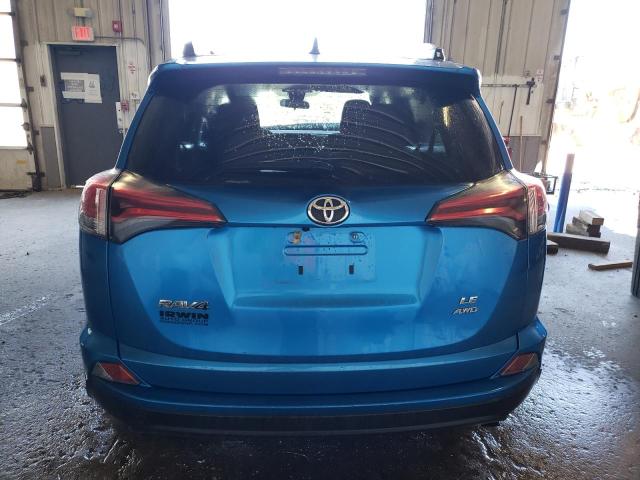 Photo 6 from auction – 2018 TOYOTA RAV4 LE with VIN JTMBFREV8JJ210213