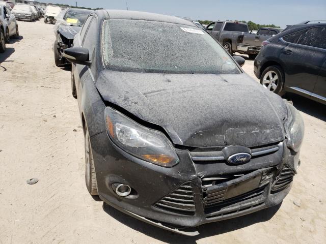 Photo 5 from auction – 2014 FORD FOCUS TITA with VIN 1FADP3N22EL381029