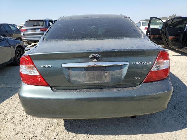 Photo 6 from auction – 2002 TOYOTA CAMRY LE with VIN 4T1BF30K42U521658