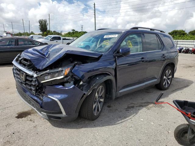 HONDA PILOT TOUR 2023 with VIN 5FNYG2H74PB002518 - Photo from auction