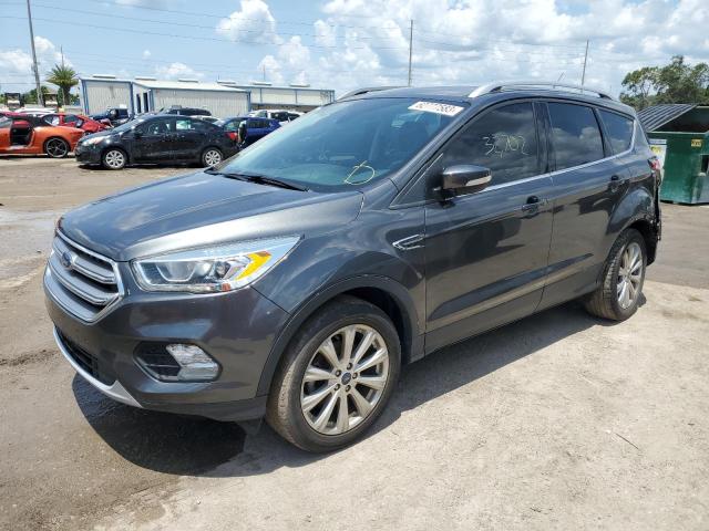 FORD ESCAPE TIT 2017 with VIN 1FMCU0JD4HUE69790 - Photo from auction