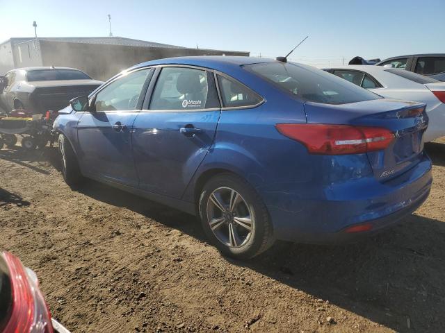 Снимка 2 от търг – 2018 FORD FOCUS SE с VIN 1FADP3F27JL204923