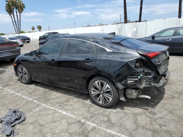 Photo 2 from auction – 2017 HONDA CIVIC EXL with VIN 2HGFC1F77HH641425