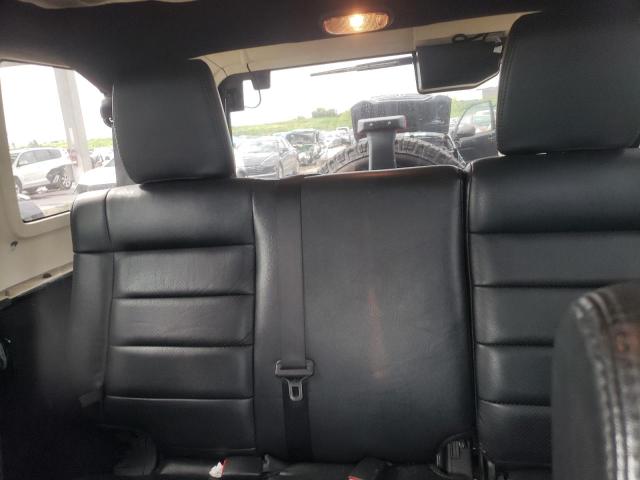 Photo 10 from auction – 2011 JEEP WRANGLER U with VIN 1J4HA5H14BL509353