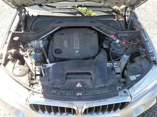 Photo 11 from auction – 2015 BMW X5 XDRIVE3 with VIN 5UXKS4C51F0J99309