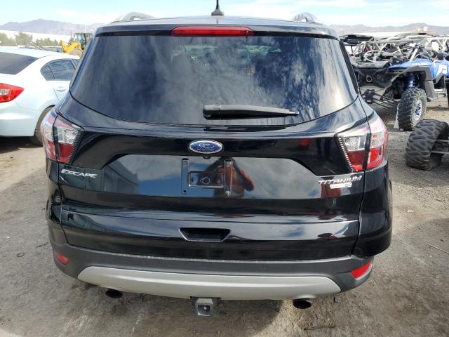 Photo 6 from auction – 2018 FORD ESCAPE TIT with VIN 1FMCU9J98JUC35982