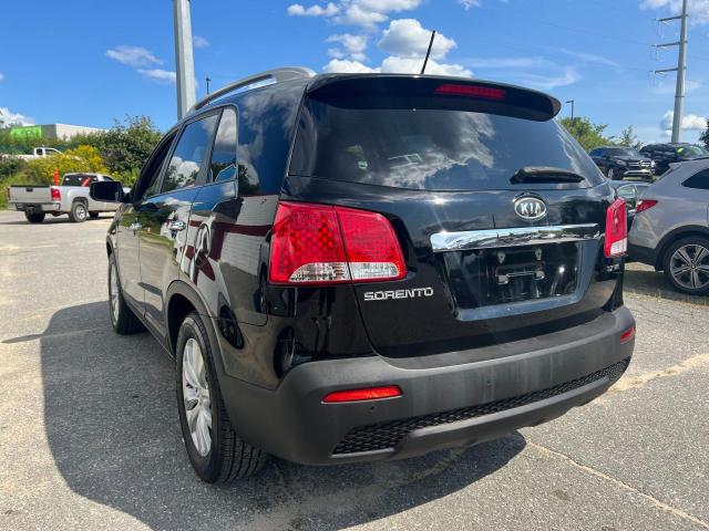 Photo 3 from auction – 2011 KIA SORENTO EX with VIN 5XYKUDA24BG052488