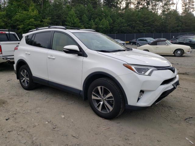 Photo 4 from auction – 2016 TOYOTA RAV4 XLE with VIN JTMRFREVXGD186874