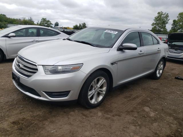 FORD TAURUS SEL 2014 with VIN 1FAHP2E81EG123240 - Photo from auction