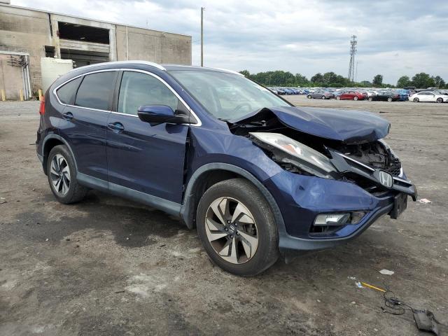 Photo 4 from auction – 2015 HONDA CR-V TOURI with VIN 5J6RM4H95FL099809