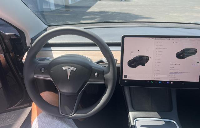 Photo 9 from auction – 2022 TESLA MODEL 3 with VIN 5YJ3E1EA6NF371162
