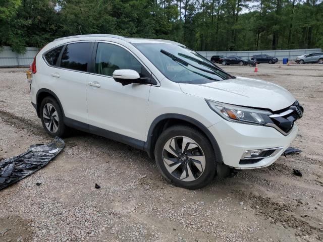 Photo 4 from auction – 2016 HONDA CR-V TOURI with VIN 5J6RM3H97GL031121