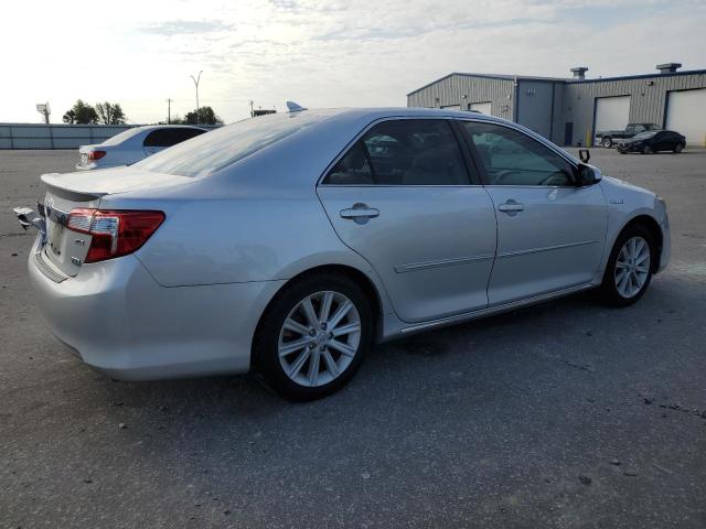 Photo 3 from auction – 2012 TOYOTA CAMRY HYBR with VIN 4T1BD1FK4CU021521