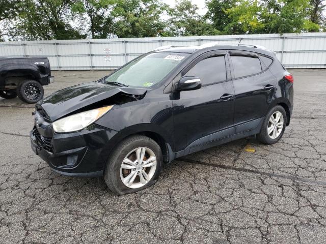 HYUNDAI TUCSON GLS 2012 with VIN KM8JUCAC7CU529635 - Photo from auction
