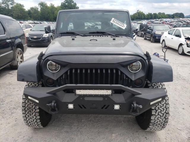 Photo 5 from auction – 2011 JEEP WRANGLER U with VIN 1J4BA5H16BL504936