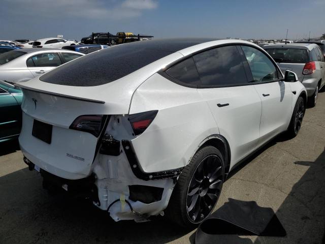 Photo 3 from auction – 2021 TESLA MODEL Y with VIN 5YJYGDEF5MF277933