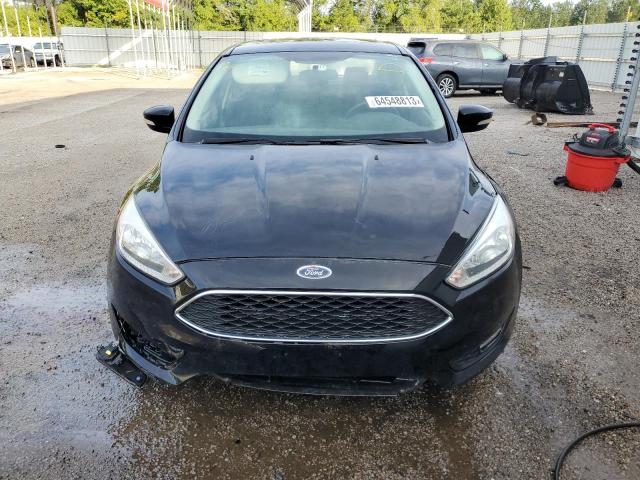 Photo 5 from auction – 2016 FORD FOCUS SE with VIN 1FADP3F2XGL401948