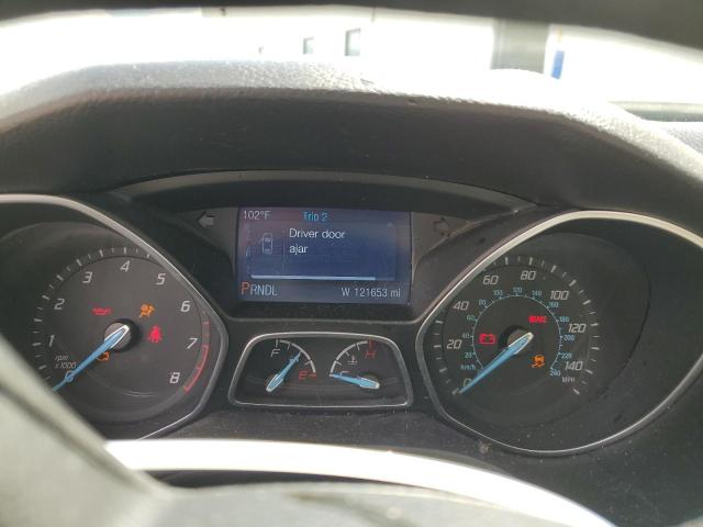 Foto 9 de la subasta – 2014 FORD FOCUS SE con VIN 1FADP3K21EL301367