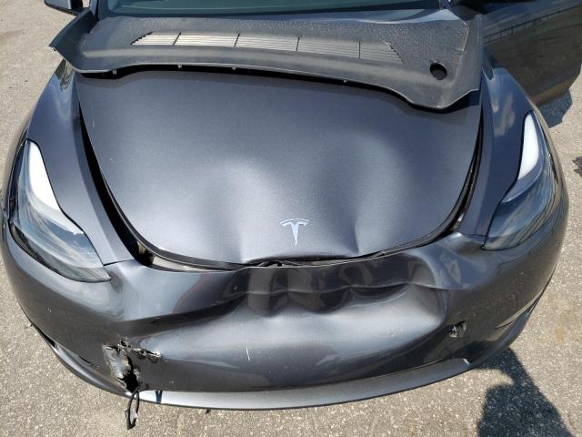 Photo 11 from auction – 2023 TESLA MODEL Y with VIN 7SAYGAEE4PF595376