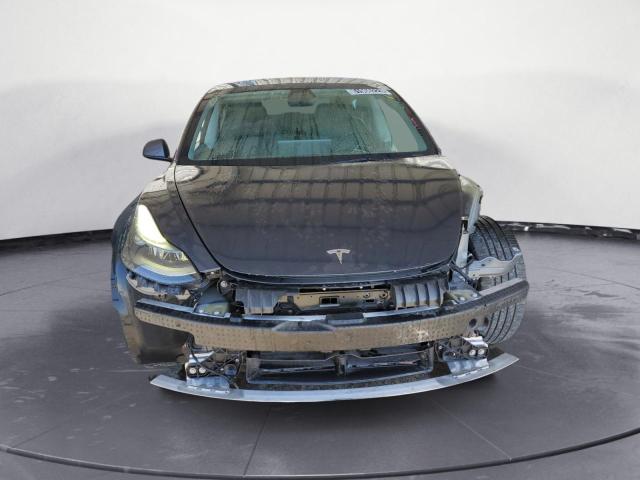 Photo 5 from auction – 2022 TESLA MODEL 3 with VIN 5YJ3E1EA0NF143481