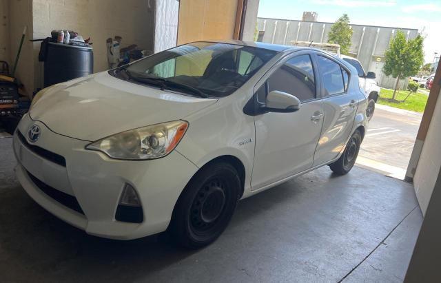 Photo 2 from auction – 2014 TOYOTA PRIUS C with VIN JTDKDTB32E1570315