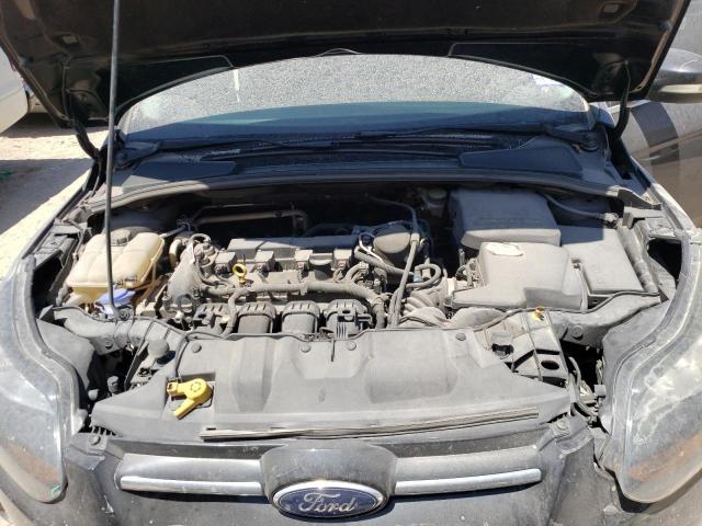 Photo 11 from auction – 2014 FORD FOCUS TITA with VIN 1FADP3N22EL381029