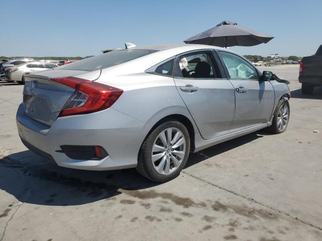 Photo 3 from auction – 2016 HONDA CIVIC EX with VIN 2HGFC1F3XGH657789