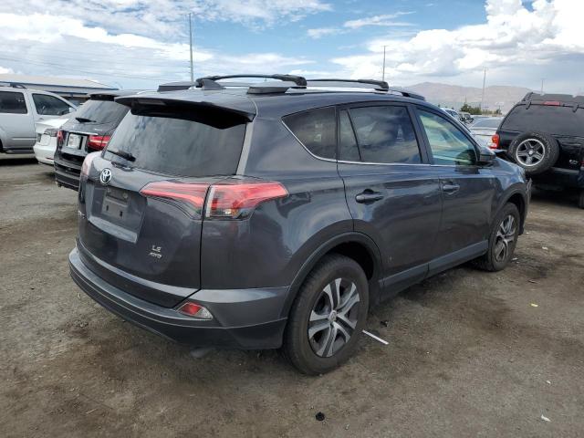 Photo 3 from auction – 2017 TOYOTA RAV4 LE with VIN JTMBFREV7HJ161533