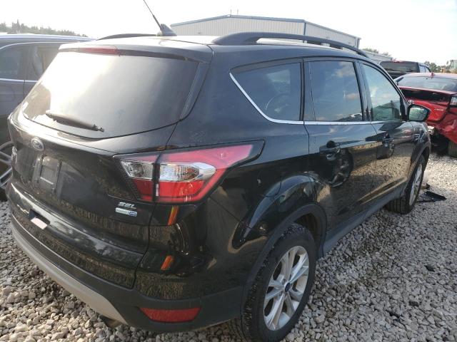 Photo 3 from auction – 2018 FORD ESCAPE SEL with VIN 1FMCU9HD4JUD16357