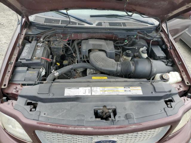 Снимка 11 от търг – 2000 FORD F150 с VIN 1FTRX18L2YNA83016
