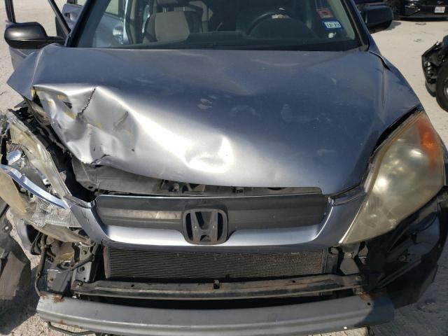 Photo 12 from auction – 2008 HONDA CR-V LX with VIN JHLRE38308C008024