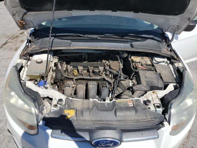 Photo 11 from auction – 2013 FORD FOCUS S with VIN 1FADP3E2XDL362114