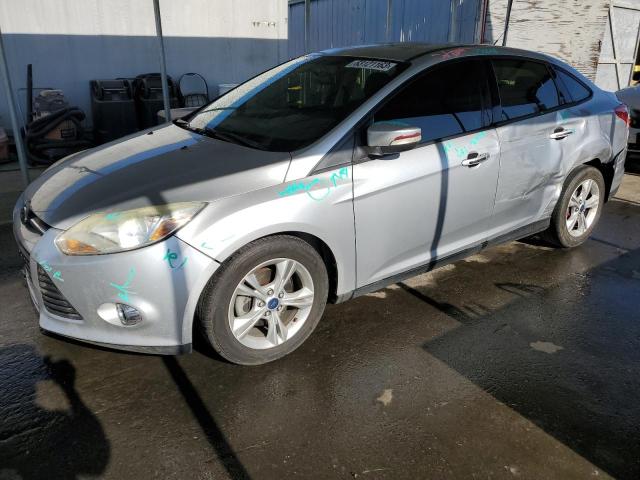 FORD FOCUS SE 2014 with VIN 1FADP3F23EL111371 - Photo from auction