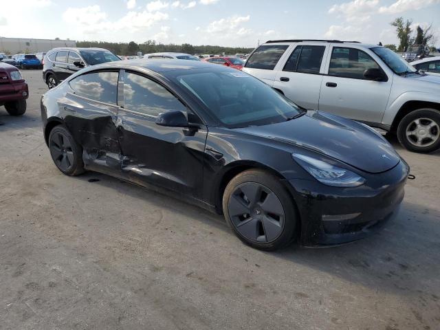 Снимка 4 от търг – 2021 TESLA MODEL 3 с VIN 5YJ3E1EBXMF848926