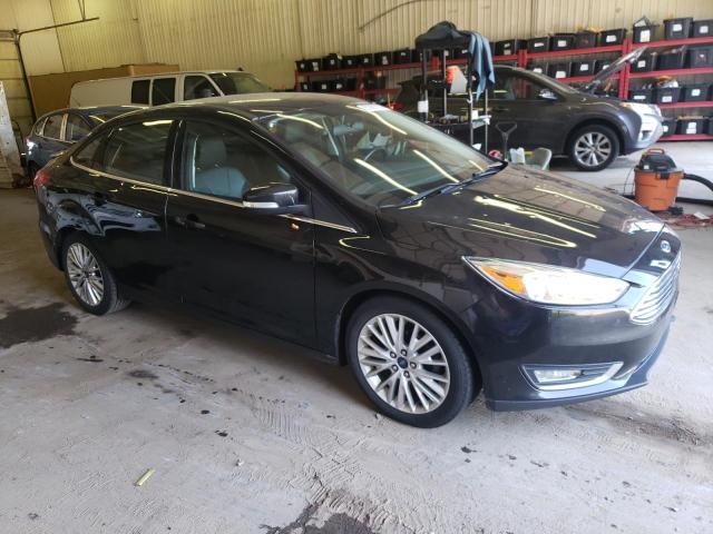 Photo 4 from auction – 2015 FORD FOCUS TITA with VIN 1FADP3J27FL271326