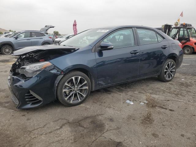 TOYOTA COROLLA L 2018 with VIN 5YFBURHE8JP790771 - Photo from auction