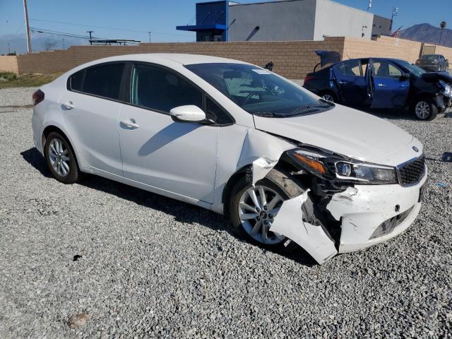 Photo 4 from auction – 2017 KIA FORTE LX with VIN 3KPFL4A74HE145274