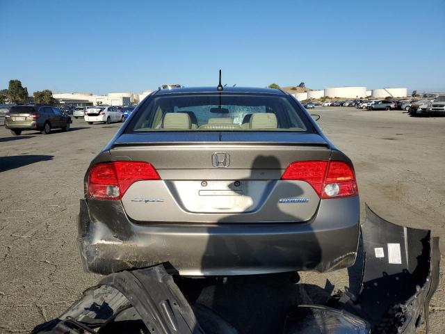 Photo 6 from auction – 2006 HONDA CIVIC HYBR with VIN JHMFA36296S018171
