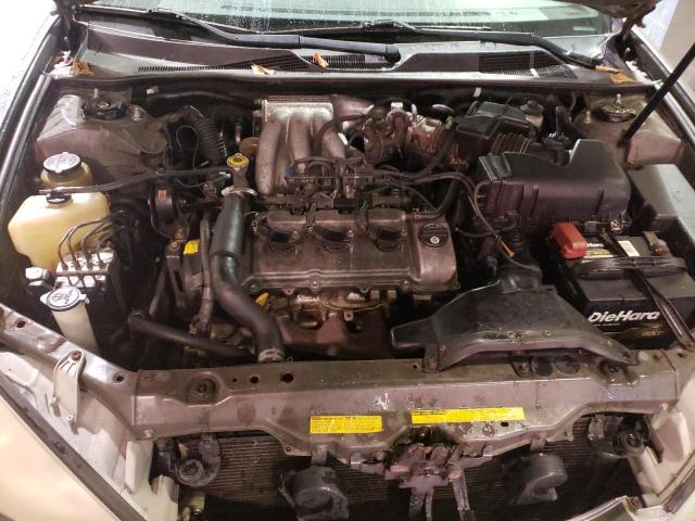 Photo 11 from auction – 2003 TOYOTA CAMRY LE with VIN JTDBF30K730112339