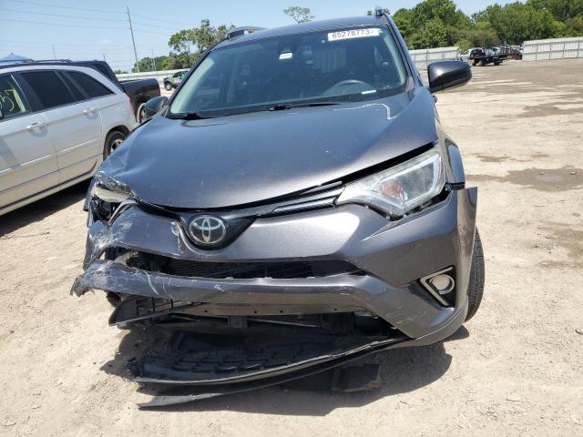 Photo 5 from auction – 2018 TOYOTA RAV4 LE with VIN JTMZFREV8JJ211571