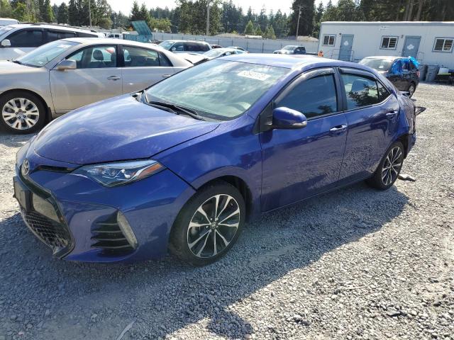 TOYOTA COROLLA L 2017 with VIN 2T1BURHE2HC877141 - Photo from auction