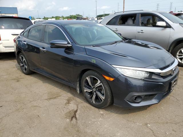 Photo 4 from auction – 2017 HONDA CIVIC TOUR with VIN 19XFC1F98HE005754