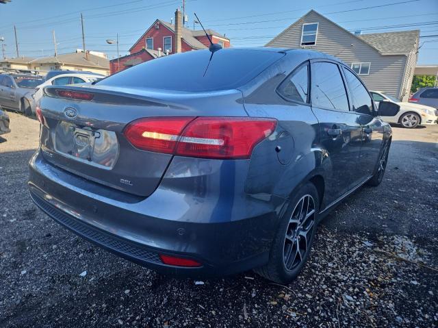 Zdjęcie 4 z aukcji – 2017 FORD FOCUS SEL z VIN 1FADP3H20HL270477